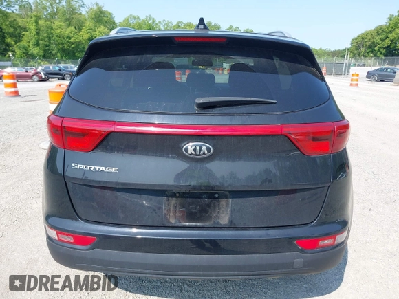 2017 Kia Sportage LX z VIN KNDPMCAC1H7285906, wystawiony jako IAAI lot #42399031 z przebiegiem 142 909 mil mil oraz . Historia ofert i sprzedaży dostępna na DreamBid. Obrazek 16.