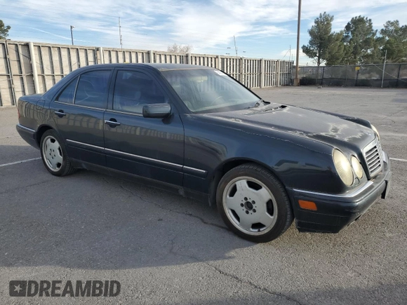 1997 Mercedes-Benz E-Class with VIN WDBJF72F8VA204316, listed as a Copart auction lot 84684614 with 203,748 mi miles and Salvage Title. Bid and sale history available at carsss.com. Image 4.
