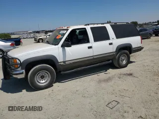 1998 GMC Suburban with VIN 3GKGK26F5WG510126, listed as a Copart auction lot 64278435 with 212,830 mi miles and Clean title. Bid and sale history available at DreamBid. Image 1.