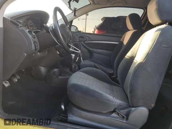 2000 Ford Focus ZX3 with VIN 3FAHP3131YR213601, listed as a Copart auction lot 88597525 with 134,724 mi miles and Salvage title. Bid and sale history available at DreamBid. Image 7.