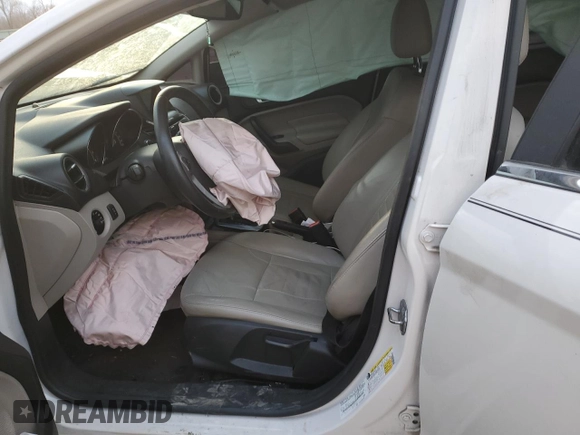 2017 Ford Fiesta Titanium with VIN 3FADP4CJ9HM136313, listed as a Copart auction lot 82610884 with Not Provided miles and Salvage Title. Bid and sale history available at DreamBid. Image 7.