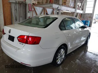 2011 Volkswagen Jetta Sedan SE with VIN 3VWDX7AJ8BM330849, listed as a IAAI auction lot 41972807 with 134,655 mi miles. Bid and sale history available at carsss.com. Image 4.