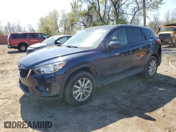 2014 Mazda CX-5 Touring with VIN JM3KE4CY4E0407868, listed as a Copart auction lot 52564315 with 137,989 mi miles and Salvage Title. Bid and sale history available at carsss.com. Image 1.