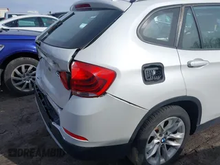 2015 BMW X1 xDrive28i with VIN WBAVL1C59FVY40443, listed as a IAAI auction lot 41777176 with 91,560 mi miles. Bid and sale history available at carsss.com. Image 14.