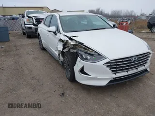 2021 Hyundai Sonata Hybrid SEL with VIN KMHL34JJ7MA032703, listed as a IAAI auction lot 41252575 with 22,067 mi miles. Bid and sale history available at carsss.com. Image 1.