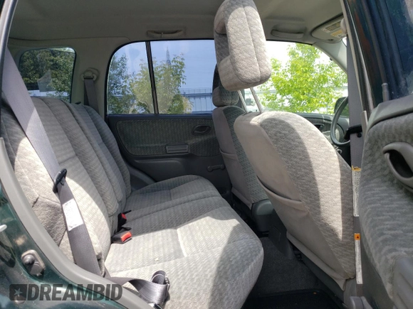 2003 Suzuki Vitara JLX z VIN 2S3TD52V136101732, wystawiony jako Copart lot #58477845 z przebiegiem 105 628 mil mil oraz Czysty tytuł • Clean title. Historia ofert i sprzedaży dostępna na DreamBid. Obrazek 11.