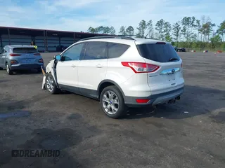 2013 Ford Escape SEL with VIN 1FMCU9H99DUA97959, listed as a IAAI auction lot 41879967 with 149,456 mi miles. Bid and sale history available at carsss.com. Image 3.