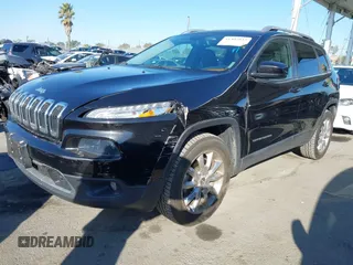 2014 Jeep Cherokee Limited with VIN 1C4PJMDB9EW210180, listed as a IAAI auction lot 41302037 with 75,177 mi miles and . Bid and sale history available at DreamBid. Image 2.