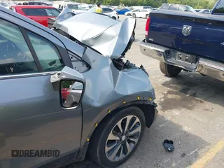 2019 Buick Encore Essence with VIN KL4CJGSM1KB890660, listed as a IAAI auction lot 40010798 with Not Provided miles and . Bid and sale history available at carsss.com. Image 18.