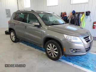 2011 Volkswagen Tiguan SE with VIN WVGBV7AXXBW544449, listed as a Copart auction lot 54678055 with 159,243 mi miles and Salvage Title. Bid and sale history available at DreamBid. Image 4.
