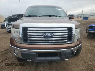 2011 Ford F-150 XLT with VIN 1FTFW1ETXBFB51042, listed as a Copart auction lot 51473695 with 179,195 mi miles and Salvage Title. Bid and sale history available at carsss.com. Image 5.