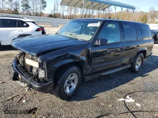 2000 Chevrolet Tahoe Limited with VIN 1GNEC13R5YR162203, listed as a Copart auction lot 83199854 with 347,572 mi miles and Salvage Title. Bid and sale history available at carsss.com. Image 1.