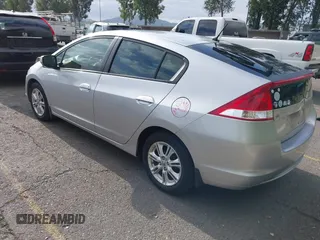 2010 Honda Insight EX with VIN JHMZE2H75AS003695, listed as a IAAI auction lot 42119429 with 90,901 mi miles and . Bid and sale history available at DreamBid. Image 3.