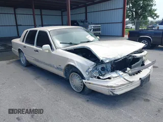 1996 Lincoln Town Car Cartier with VIN 1LNLM83W7TY634343, listed as a IAAI auction lot 42474123 with 193,705 mi miles and . Bid and sale history available at DreamBid. Image 1.