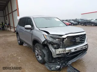 2022 Honda Passport EX-L with VIN 5FNYF8H57NB000876, listed as a IAAI auction lot 41441943 with 57,248 mi miles. Bid and sale history available at carsss.com. Image 1.
