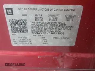 2018 Chevrolet Equinox LT z VIN 2GNAXSEV0J6243503, wystawiony jako Copart lot #58794125 z przebiegiem 43 562 mil mil oraz Szkoda całkowita • Salvage title. Historia ofert i sprzedaży dostępna na DreamBid. Obrazek 13.