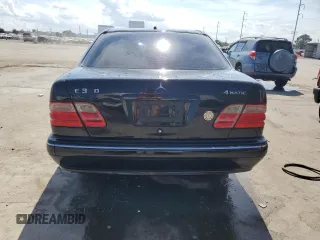2001 Mercedes-Benz E-Class AWD with VIN WDBJF82J21X056553, listed as a Copart auction lot 73046694 with 0 mi miles and Salvage Title. Bid and sale history available at carsss.com. Image 6.