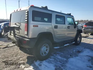 2005 Hummer H2 SUV with VIN 5GRGN23U55H128736, listed as a Copart auction lot 41780105 with 185,193 mi miles and Salvage Title. Bid and sale history available at carsss.com. Image 3.