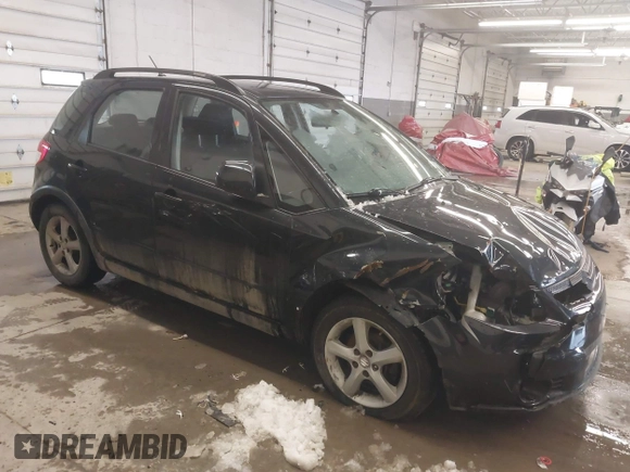 2009 Suzuki SX4 Man AWD with VIN JS2YB413096204911, listed as a IAAI auction lot 41572173 with 84,763 mi miles. Bid and sale history available at carsss.com. Image 1.