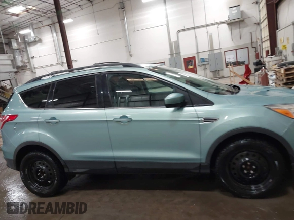 2013 Ford Escape SE with VIN 1FMCU0GX9DUB40739, listed as a IAAI auction lot 41633757 with 87,522 mi miles and . Bid and sale history available at DreamBid. Image 13.