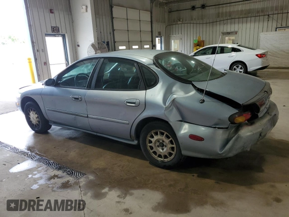 1997 Ford Taurus LX with VIN 1FALP53S8VA114239, listed as a Copart auction lot 56534025 with 110,834 mi miles and Salvage title. Bid and sale history available at DreamBid. Image 2.
