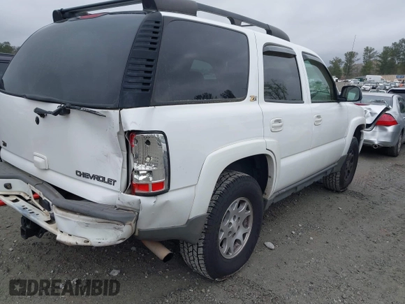 2004 Chevrolet Tahoe LS with VIN 1GNEK13ZX4R308382, listed as a IAAI auction lot 41901448 with 205,922 mi miles. Bid and sale history available at carsss.com. Image 4.