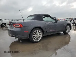 2017 FIAT 124 Spider Lusso z VIN JC1NFAEK8H0104765, wystawiony jako Copart lot #52759754 z przebiegiem 82 970 mil mil oraz Szkody całkowita. Historia ofert i sprzedaży dostępna na DreamBid. Obrazek 3.