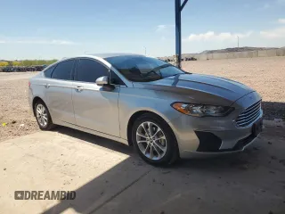 2020 Ford Fusion SE with VIN 3FA6P0HD3LR127008, listed as a Copart auction lot 54830665 with 122,179 mi miles and Salvage title. Bid and sale history available at DreamBid. Image 4.
