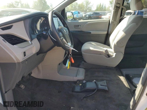 2019 Toyota Sienna L with VIN 5TDZZ3DC5KS972437, listed as a Copart auction lot 69219564 with 85,603 mi miles and Salvage Title. Bid and sale history available at carsss.com. Image 7.