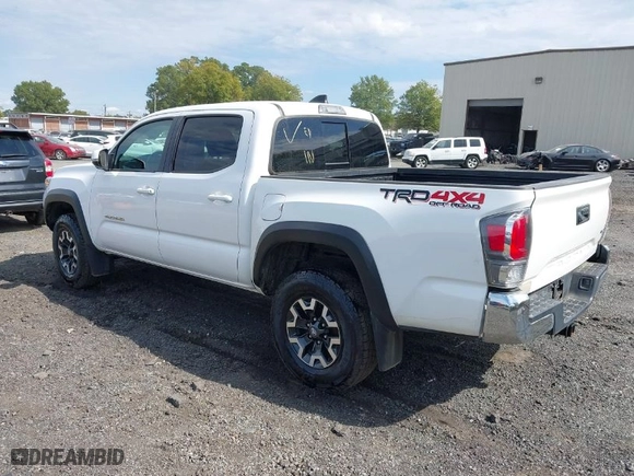 2021 Toyota Tacoma 4WD SR with VIN 3TMCZ5AN8MM424104, listed as a IAAI auction lot 40581284 with 74,706 mi miles. Bid and sale history available at carsss.com. Image 3.