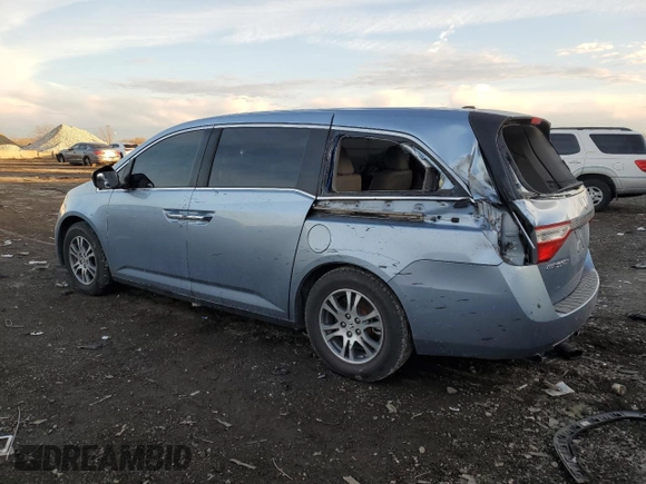 2012 Honda Odyssey EX-L with VIN 5FNRL5H64CB002814, listed as a Copart auction lot 44134505 with 131,235 mi miles and Salvage Title. Bid and sale history available at carsss.com. Image 2.