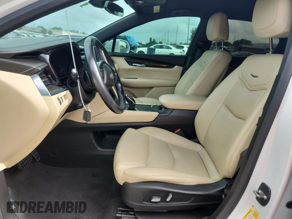 2018 Cadillac XT5 FWD with VIN 1GYKNARSXJZ153562, listed as a Copart auction lot 60137185 with 49,425 mi miles and Clean title. Bid and sale history available at DreamBid. Image 7.
