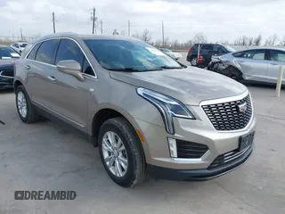 2022 Cadillac XT5 FWD Luxury with VIN 1GYKNAR48NZ108773, listed as a IAAI auction lot 41729558 with 30,300 mi miles and . Bid and sale history available at DreamBid. Image 1.