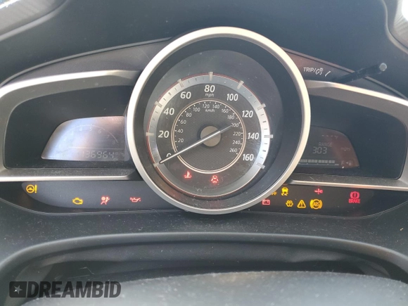 2016 Mazda 3 i Touring z VIN JM1BM1W70G1299548, wystawiony jako Copart lot #52575085 z przebiegiem 136 964 mil mil oraz Szkoda całkowita • Salvage title. Historia ofert i sprzedaży dostępna na DreamBid. Obrazek 9.