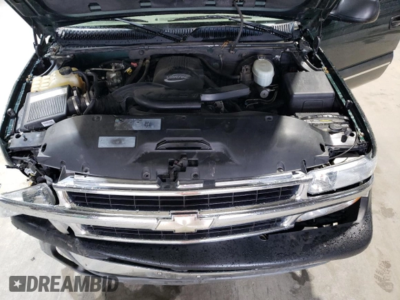 2003 Chevrolet Tahoe LS z VIN 1GNEC13Z23R264941, wystawiony jako Copart lot #56033135 z przebiegiem 195 068 mil mil oraz Szkoda całkowita • Salvage title. Historia ofert i sprzedaży dostępna na DreamBid. Obrazek 12.