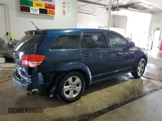 2013 Dodge Journey American Value with VIN 3C4PDCAB4DT581984, listed as a Copart auction lot 59953515 with 166,927 mi miles and Salvage title. Bid and sale history available at DreamBid. Image 3.