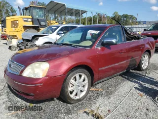 2005 Ford Five Hundred Limited with VIN 1FAFP251X5G130679, listed as a Copart auction lot 74371274 with 141,908 mi miles and Salvage title. Bid and sale history available at DreamBid. Image 1.