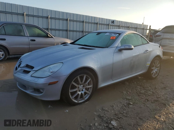 2005 Mercedes-Benz SLK-Class with VIN WDBWK56FX5F060562, listed as a Copart auction lot 73662754 with 0 mi miles and Salvage Title. Bid and sale history available at carsss.com. Image 1.