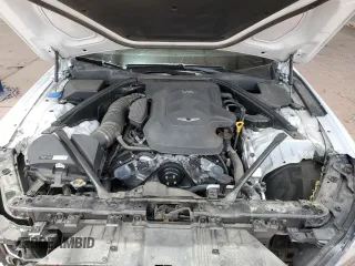 2018 Genesis G80 3.8L z VIN KMHGN4JE3JU285266, wystawiony jako Copart lot #58053355 z przebiegiem 69 335 mil mil oraz Szkoda całkowita • Salvage title. Historia ofert i sprzedaży dostępna na DreamBid. Obrazek 11.