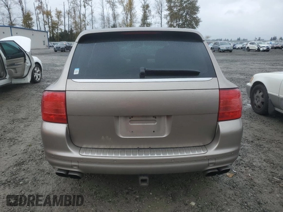 2005 Porsche Cayenne Turbo z VIN WP1AC29P75LA90100, wystawiony jako Copart lot #74377104 z przebiegiem 209 034 mil mil oraz Szkoda całkowita • Salvage title. Historia ofert i sprzedaży dostępna na DreamBid. Obrazek 6.