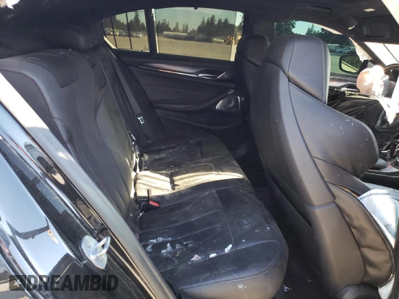 2018 BMW M5 z VIN WBSJF0C57JB283361, wystawiony jako Copart lot #65352164 z przebiegiem Nie podano mil oraz Szkoda całkowita • Salvage title. Historia ofert i sprzedaży dostępna na DreamBid. Obrazek 10.