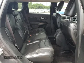 2019 Jeep Cherokee Latitude Plus z VIN 1C4PJLLB5KD226718, wystawiony jako Copart lot #62527585 z przebiegiem 99 990 mil mil oraz Szkoda całkowita • Salvage title. Historia ofert i sprzedaży dostępna na DreamBid. Obrazek 11.
