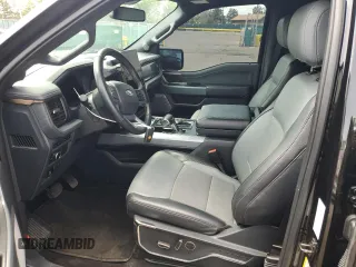 2023 Ford F-150 Lightning Pro z VIN 1FTVW1EV8PWG04482, wystawiony jako Copart lot #44312535 z przebiegiem 58 139 mil mil oraz Szkoda całkowita • Salvage title. Historia ofert i sprzedaży dostępna na DreamBid. Obrazek 7.