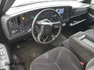 1999 GMC New Sierra 1500 SLE with VIN 2GTEC19TXX1543015, listed as a Copart auction lot 85465164 with 144,396 mi miles and Salvage Title. Bid and sale history available at carsss.com. Image 8.