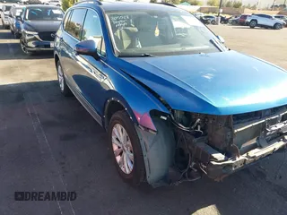 2018 Volkswagen Tiguan SEL with VIN 3VV3B7AX4JM001454, listed as a IAAI auction lot 41337213 with 82,624 mi miles and . Bid and sale history available at DreamBid. Image 1.