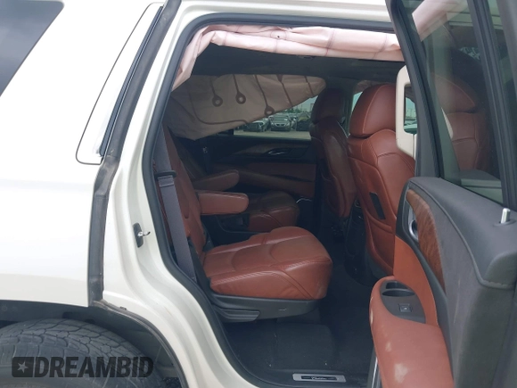 2015 Cadillac Escalade Premium z VIN 1GYS4CKJ4FR216873, wystawiony jako IAAI lot #41677234 z przebiegiem 128 990 mil mil oraz . Historia ofert i sprzedaży dostępna na DreamBid. Obrazek 8.