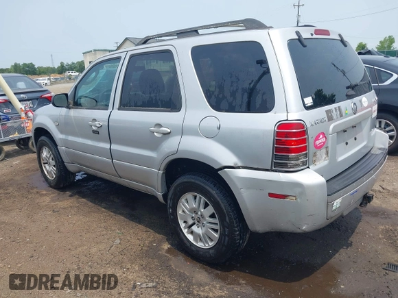 2005 Mercury Mariner Luxury z VIN 4M2CU57135DJ23718, wystawiony jako IAAI lot #42441869 z przebiegiem 179 378 mil mil oraz . Historia ofert i sprzedaży dostępna na DreamBid. Obrazek 3.