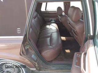 1988 Lincoln Town Car z VIN 1LNBM82F1JY730690, wystawiony jako IAAI lot #41749629 z przebiegiem 96 559 mil mil oraz . Historia ofert i sprzedaży dostępna na DreamBid. Obrazek 8.