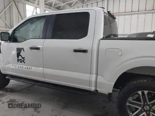 2023 Ford F-150 XL with VIN 1FTEW1EP7PKE20482, listed as a IAAI auction lot 41848669 with 27,933 mi miles. Bid and sale history available at carsss.com. Image 14.