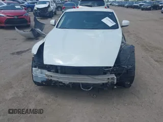 2012 Nissan 370Z z VIN JN1AZ4EH5CM564517, wystawiony jako IAAI lot #42385869 z przebiegiem 55 359 mil mil oraz . Historia ofert i sprzedaży dostępna na DreamBid. Obrazek 13.
